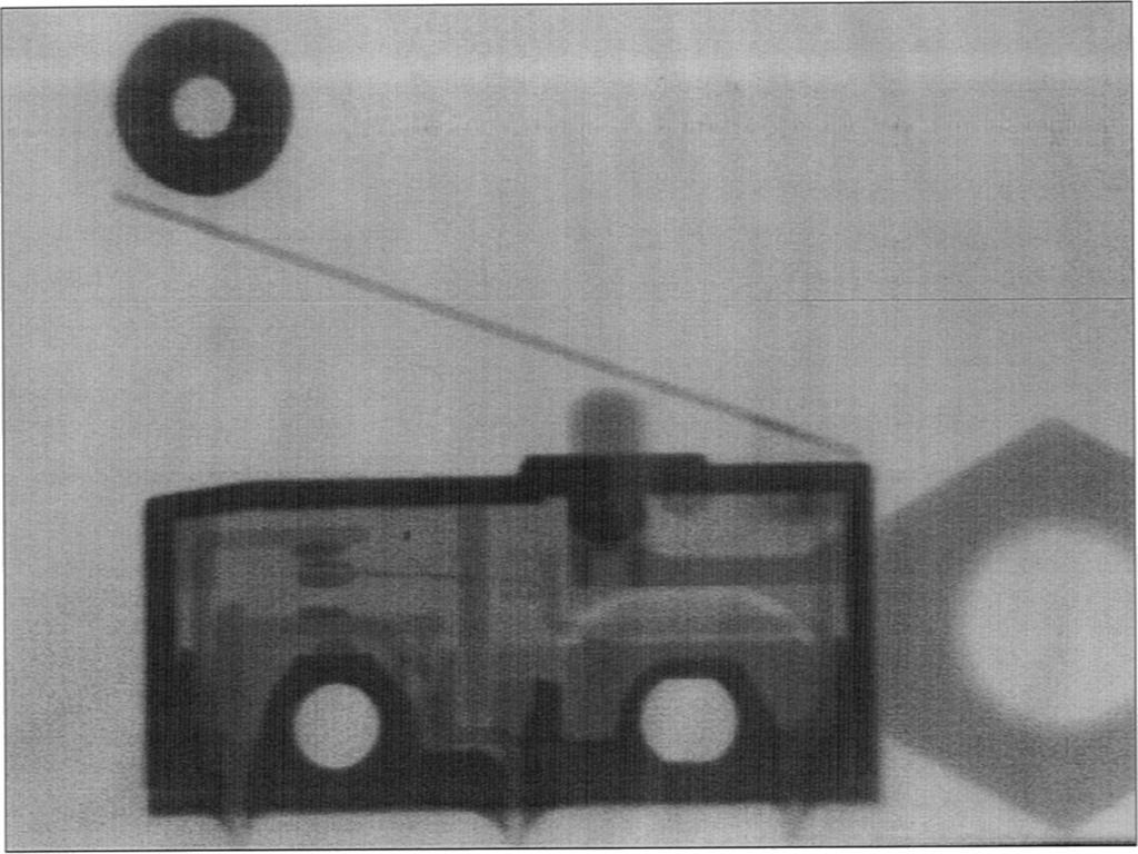 188 G. Bruckner et al./nuclear Instruments and Methods in Physics Research A 424 (1999) 183 189 Fig. 8. Transmission image of a micro switch next to a nut as seen by the double-sided strip detector.