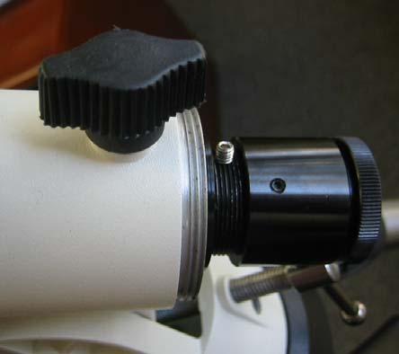 3. Insert polar scope all the way into the scope housing, as shown in Figure 3. The polar scope will be tight fitted into the scope house. Secure the scope by tightening the set screw.