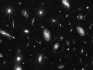 Effects of gravitational lensing on background galaxies Bending of light by cluster Abell 2218 Lensing by