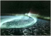 cascade toward the Earth, producing aurorae