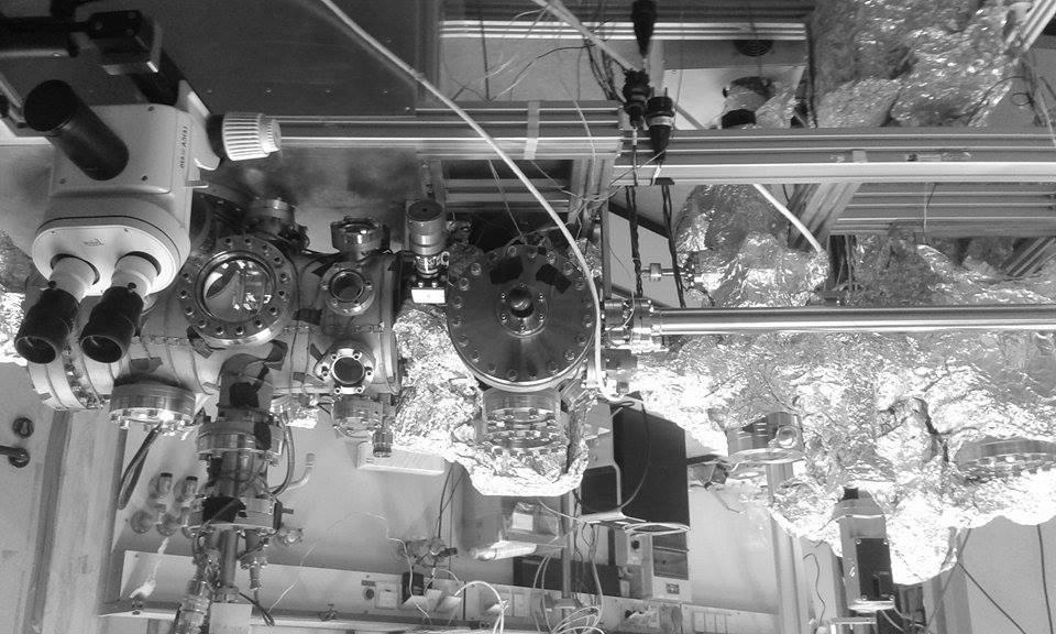 Figure 3: A photograph showing the UHV system. An optical microscope is placed at the STM chamber for closer sample observations and for support during the tip approach procedure.