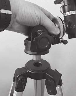 Insert the 25mm eyepiece (W) into the focuser and secure it by lightly tightening the thumbscrew (Figure 17). The telescope is now completely assembled!
