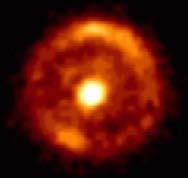 Einstein ring: a prototypical example Optical image of the radio source 1938+666, taken with the Hubble Space Telescope, shows the Einstein ring most prominently.