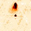 106 B.14 SDSS J091401.76+050750.6 Figure B.14: The 3 x 3 radio image (top) of SDSS J091401.76+050750.6 shows a bright core source with and one bright lobe to the south.