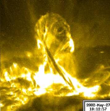 The kink instability of a coronal magnetic loop 171 Figure 4: Left: two stages of a failed prominence eruption as observed by the TRACE satellite (http://vestige.lmsal.