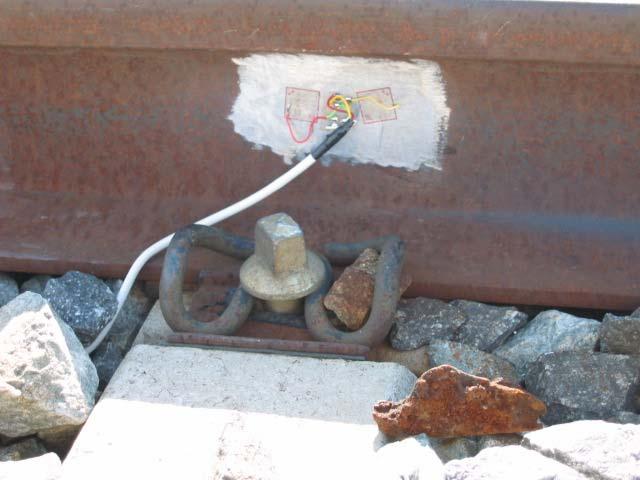 1 shows two accelerometers, one at the rail base and the other at the concrete sleeper. Figure 3.