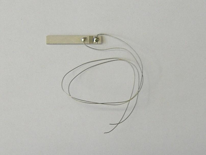 5 mm thick. Approximate capacity is 1pF having low frequency limit 15 c/s. The dimension of this strain gauge is 2mm x 3 mm x.5 mm. For the lower Figure 5.