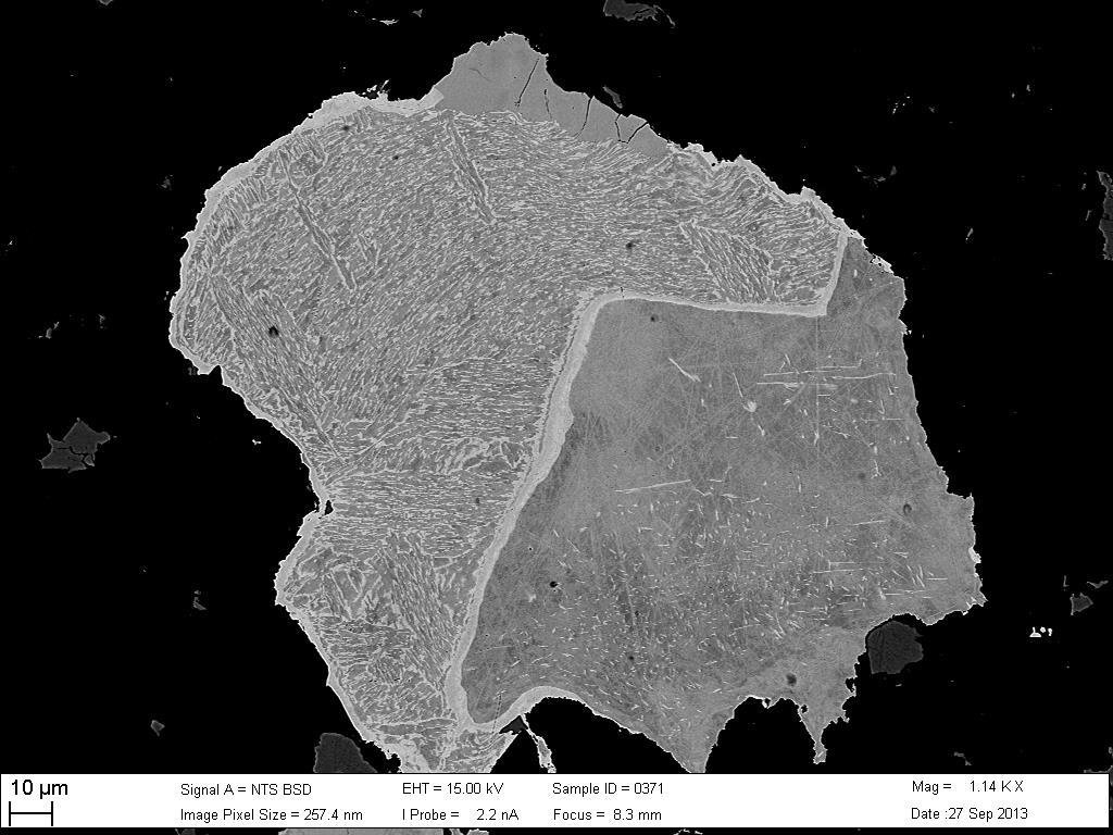 Figure 17: Backscatter electron micrograph of decomposed martensite grain showing the left portion decomposed forming plessite.