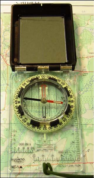 turn the map and compass together until the red end of the magnetic needle is over the orienting arrow.