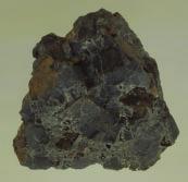 10.4 Half-Life Figure 1 Pitchblende, the major uranium ore, is a heavy mineral that contains uranium oxides, lead, and trace amounts of other radioactive elements.
