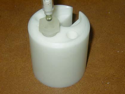 Loosen cap holding ph probe tip in the storage vial