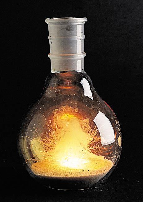 Figure 4.13: The burning of calcium metal in chlorine. Photo courtesy of James Scherer.