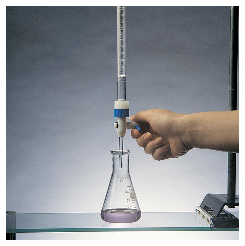 Figure 4.23: Titration of an unknown amount of HCl with NaOH. Photo courtesy of James Scherer.