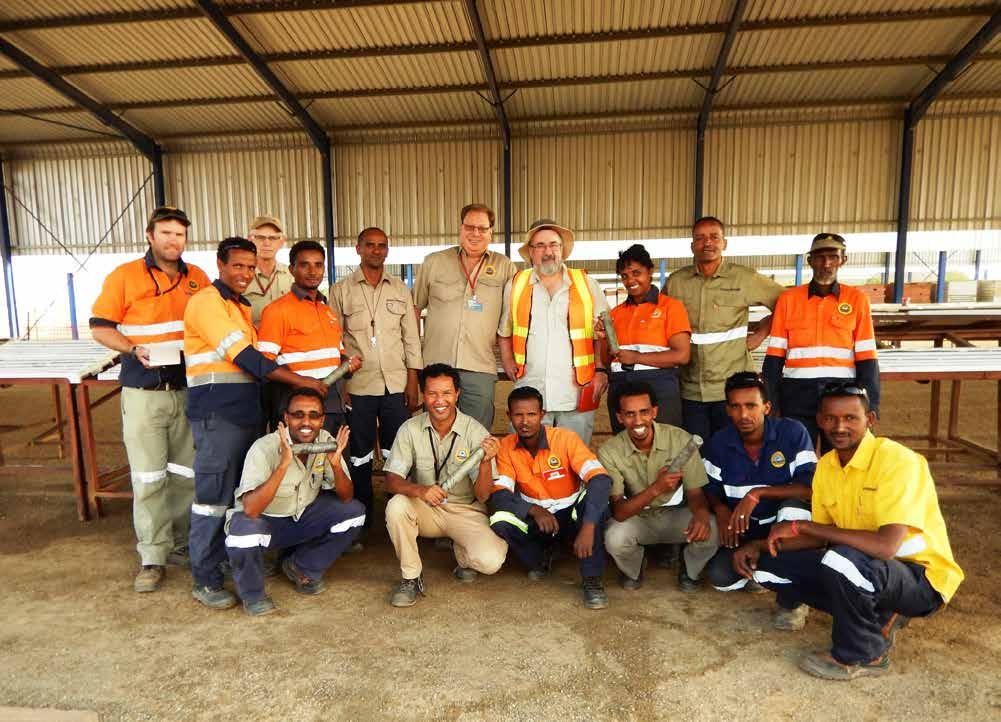 Bisha exploration team Bisha exploration team with drill core from Asheli hole MX-052 Middle, back row (no hat):