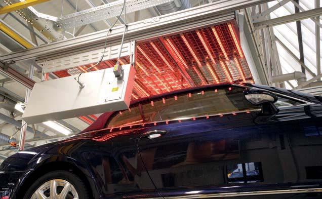 The size was reduced to less than one-fifth of the size of the old oven. The infrared lamps are contoured to match the shape of the cylinder, allowing even heat application and curing.
