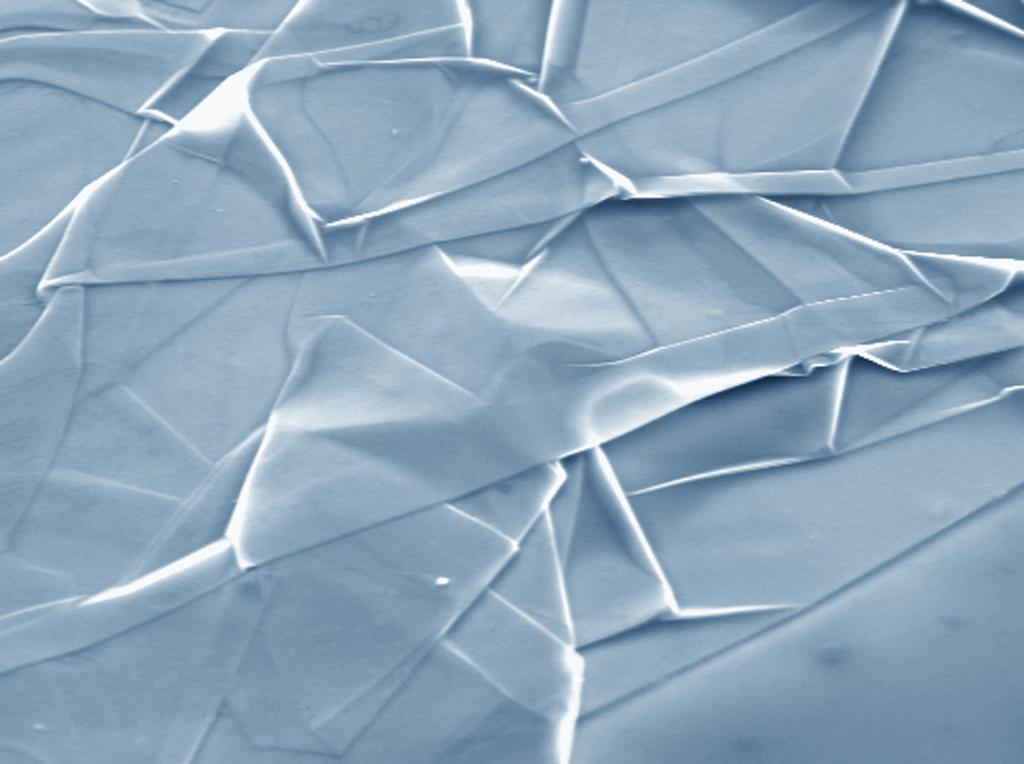 graphene GRAPHENE Si Graphene nanofabric. SEM micrograph of a strongly crumpled graphene sheet on a Si wafer. Note that it looks just like silk thrown over a surface.