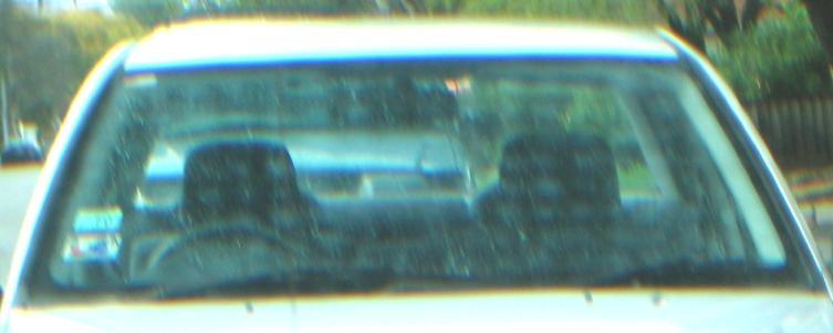What s going on The photograph at the right was taken through polarizing sunglasses and through the rear window of a car.