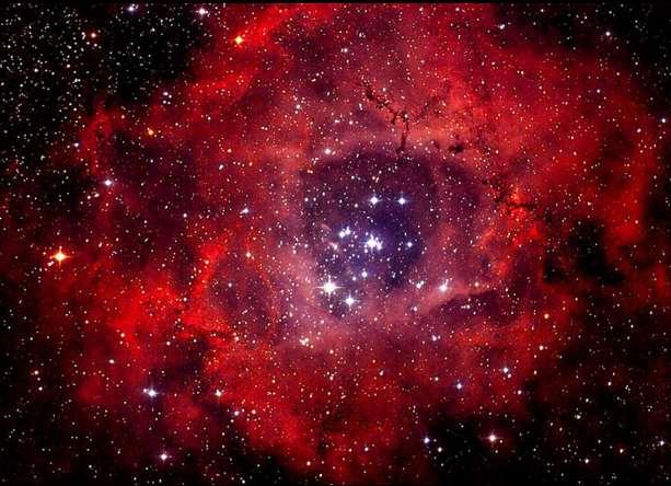 Rosette Nebula (also known as Caldwell 49) is a large, circular H II region located near one end of a giant molecular cloud in the Monoceros region of the Milky