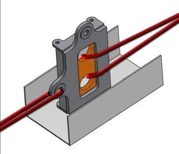 A sling is attached through the holes and is connected to the hydraulic tensile bench, which gradually applies the load through the sling.