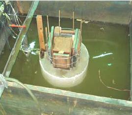 Wave absorbing devices were installed on the sides of the water tank which were perpendicular to the direction of the input waves in order to eliminate the reflected waves.
