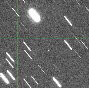 Figure 3 captures this asteroid in the same frame as another satellite (TDRS 3) on its incoming (not yet closest approach) trajectory.