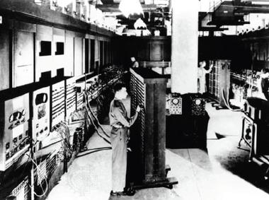 Figure 1.1 One of the first computers, ENIAC, weighing 30 tons and occupying a 15x9 m largeroom,wasbuiltinthe1940s,beforenanofabricationtechniqueswereavailable.