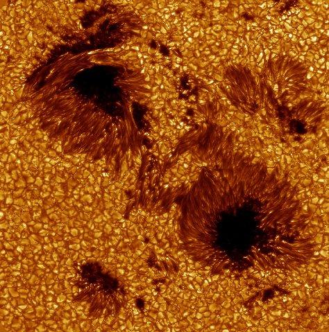 Features of the Photosphere Sunspots are features in the photosphere created by interactions with the Sun's magnetic field Just like a huge magnet, some bodies in the Solar System (like the Sun,