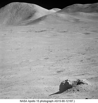 http://www.psrd.hawaii.edu/july10/dampmoonrising.html 3 Sample 15404,51 was collected as part of the soil that is piled up in this photograph of the boulder at Station 6a, Apollo 15.