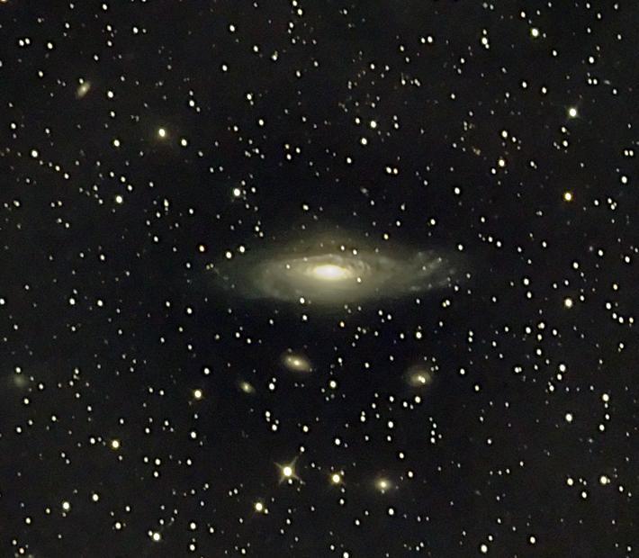 The galaxies average apparent size might fool the observer into believing this is an average size galaxy but in reality it is one of the largest galaxies known.