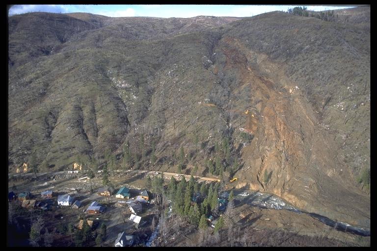 Wildfires can cause landslides on steep slopes because 1. They heat up and melt the rocks. 2.