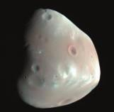 (Images from the Mars Reconnaissance Orbiter.) become an orbiting moon.
