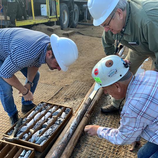 Figure 6: Mario Stifano, CEO Cordoba Minerals (left), Charles Forster, Vice President Exploration HPX (centre) and Timothy Marsh President and CEO Bell Copper (right) inspecting freshly drilled core