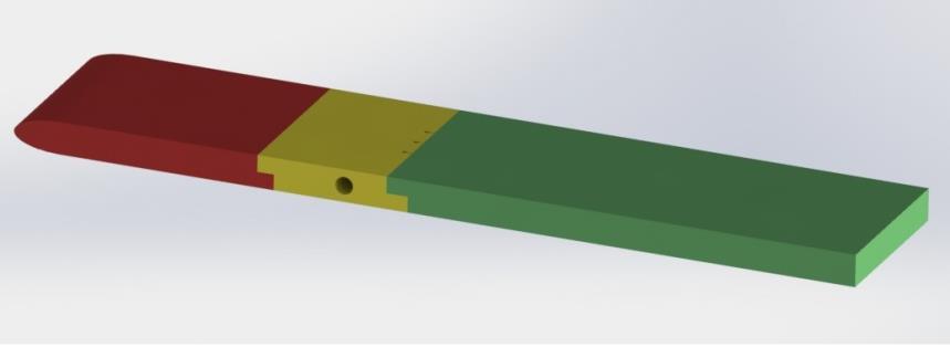 Its nose has a smooth profile, allowing a regular boundary layer development along both flat plate surfaces. Cooling is assured by the presence of a row of three holes (5 mm diameter) located 0.