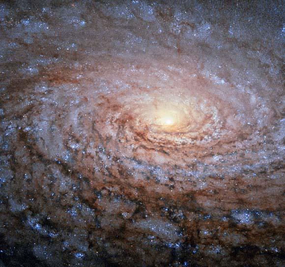 Messier 63 This newly released Hubble image shows spiral galaxy Messier 63, which is also known as the Sunflower Galaxy.