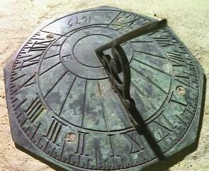 Why is the shadow of the sundial changing?