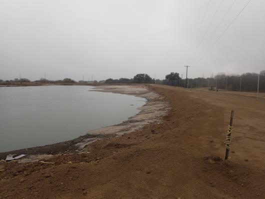 Photograph: 11 Evaporation Pond standing on northwest corner facing east. Photo taken 12/19/17.