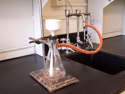 Make sure that flexible vacuum tubing is used to connect the filter flask to the water aspirator. DO NOT connect the tubing to the water outlet.
