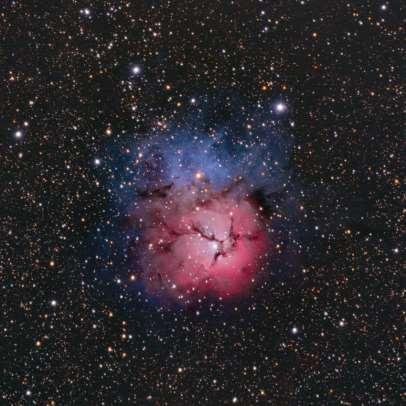 Trifid Nebula (M20) The Trifid Nebula is a large starforming region located in Sagittarius The nebula s name means divided