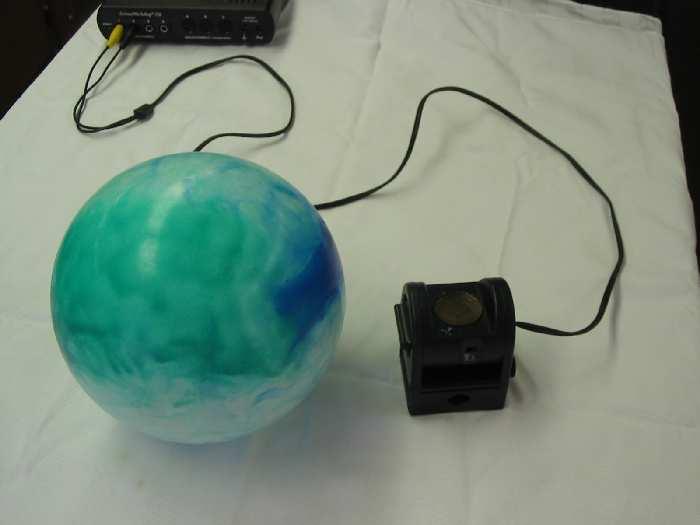Figure 7.5: Ball and motion detector used in this lab. This part of the experiment will observe the interplay of kinetic, potential and total energy of a tossed ball.