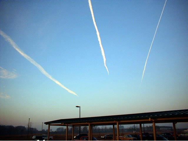 The airplane is barely visible in this photo but is at the front of the contrail Persistent Contrails These are very distinct contrails, and show a range from persistent non-spreading on the right to