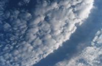 of puffy clouds in rows, rounded masses, rolls etc referred as sheep clouds or woolpack clouds