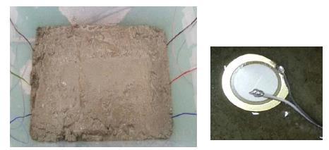 concrete cube. In order to protect the PZT transducers from water, they were covered with acryl coating (AC-100). Fig.