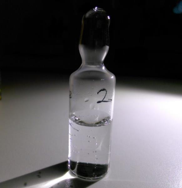Figure 2: 18 F ampoule where drops, bubbles and condensation are noted Table 2: The 18 F and 99m Tc standardizations by the NMISA Radionuclide 18 F Measurement method ACRONYM* IC calibrated