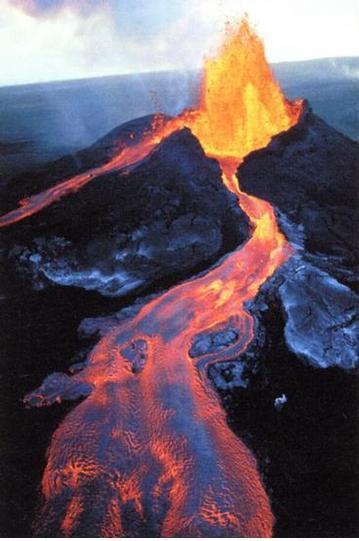 4. THE EARTH AND ROCKS The picture shows an erupting volcano. Source: minyanville.com Circle the correct option in each of the statements below.