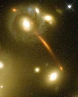 Strong Galaxy- Galaxy Lensing in Cluster Cluster Galaxies are breaking arcs into smaller ones, adding new
