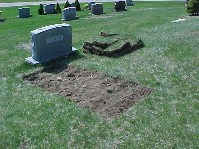 This gravesite is being prepared for a burial.