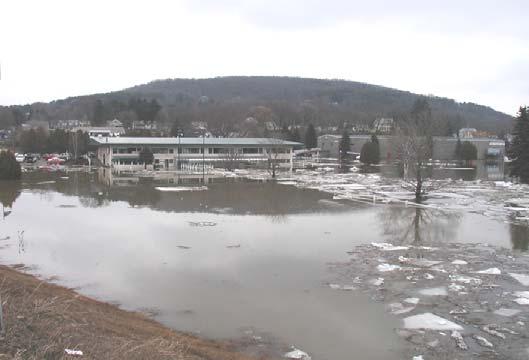 The water flooded a golf course, pub and ice skating rink as seen above.
