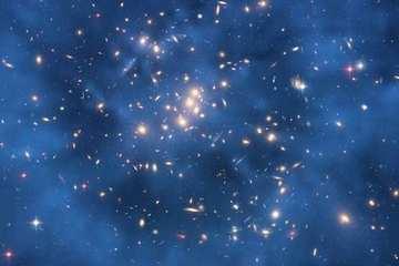 Not Particles, But Chunks: Dark Matter Gets Stranger The Hubble Space Telescope captured this image of galaxy cluster ZwCl0024+1652, revealing a ghostly ring of dark matter floating within the