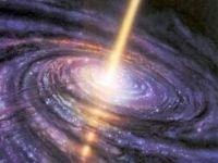 By accreting mass through an accretion disk Via