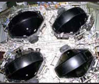 Each mirror satellite consists of lightweight mirror membranes suspended at 3 points by 3 booms telescoping out from a center body.